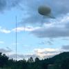 Tethered balloon kite above the trees in Portugal