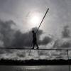 Man walks on high wire