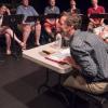 Tom Cipullo rehearses with opera performers