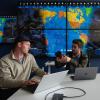 Graduate students Michael Klonowski, left, and Daniel Aguilar-Marsillach, right, work in the Raytheon Space & Intelligence Vision, Autonomy, and Decision Research (VADeR) at CU Boulder, which studies new methods for tracking and managing satellite traffic in space. (Credit: CU Boulder College of Engineering and Applied Science) 