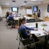 Lauren Harris leads HR training class for supervisors