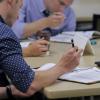 Employees take a manager's course for professional development.