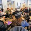 Diversity and Inclusion Summit attendees sit in circle during session