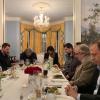 Steve Bannon and Ben Teitelbaum pray over a meal