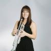 Sarah Stoneback holding her trumpet