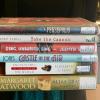 Example titles by authors who were community picks for Norlin Libary display