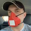 Nick Schuster wearing a mask he printed