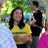 A representative of ShineOn speaks with the public