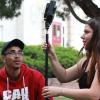 Nathaniel Nash and Rachel Boyce set up a light stand. (Photo courtesy of CMCI.)