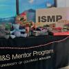 A table showing off gifts gathered for the ISMP Gives program