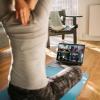 Person participates in a live virtual workout class