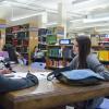 Two students talking at Norlin Library