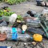 Plastic bottles and other trash on a beach