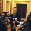 Professor John Zhai speaking with news media at the World IoT Exposition in China