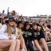 students at football game