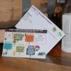 A photo showing a postcard from the 2019 ASSETT Innovation Incubator Kick-off