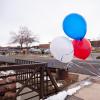 Red, white and blue balloons near the Table Mesa King Soopers