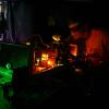 Student working on a laser in a lab at JILA