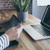  A person with a laptop and tablet. (Lara Far on Unsplash)