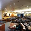 Audience members tune into a talk in Wolf Law