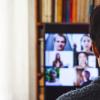 Stock image of a person on a Zoom call