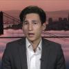 Lee Fang talks to a reporter