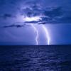 Lightning strike over the ocean
