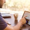 Person scrolling on tablet