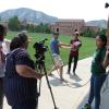 Students filming something on campus