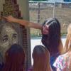 Jasmine Baetz talks to CU Science Discovery campers about one of the mosaic portraits. (Photo by Lisa Schwartz, CU Boulder)