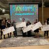 Lab Venture Challenge biosciences winners holding giant checks