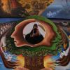 CU Boulder photographer takes a self portrait on a mural in Norlin Library in 2018