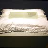 Tim Whiten American, b. 1941, Mary’s Permeating Sign, 2006, cast, sand blasted glass, cotton pillow, 8 x 24 x 15 inches, Collection of Art Gallery of Hamilton, Gift of the artist in memory of Tom & Mary E. Whiten, 2019.1.5. (Image courtesy of Tim Whiten and Olga Korper Gallery.)