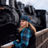 Megan Mangum stands by train reflecting on past