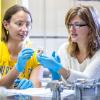 Virginia Ferguson in the lab with a student