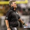 Mike MacIntyre coaching during game