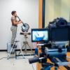 A musician is videotaped while playing