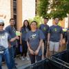 Volunteers gather for a photo during move-in