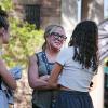 A family hugs during move-in 2022
