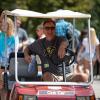 Volunteer driving golf cart during move-in