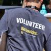 An employee volunteering during move-in