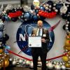 Tom Woods receiving NASA award