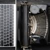 A laptop computer and a typewriter sit back to back