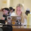 Students working on laptops in Norlin Library