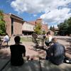 Students studying near Norlin fountain