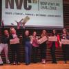 New Venture Challenge participants celebrate on stage on female founders night.