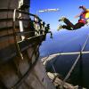 Man BASE jumping off a building