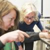 Stephanie Bryant in her lab with a graduate student