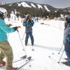 A group of people on the ski slope