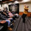 Angie Paccione speaks to members of the women’s basketball team during her visit